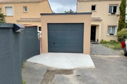 Garage toit terrasse en béton enduit